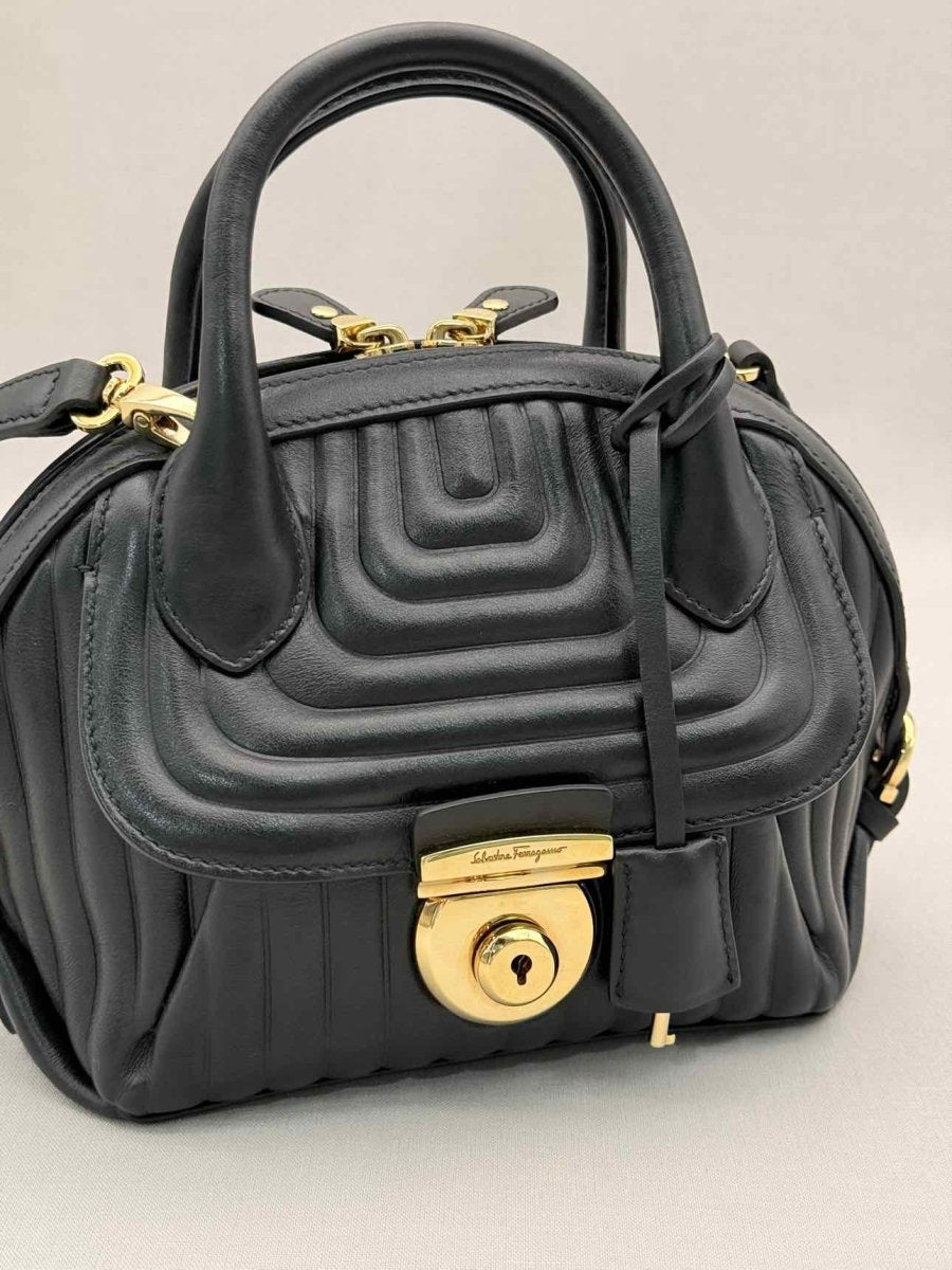 Pre-loved SALVATORE FERRAGAMO Flamma Black Quilted Satchel at Reems Closet