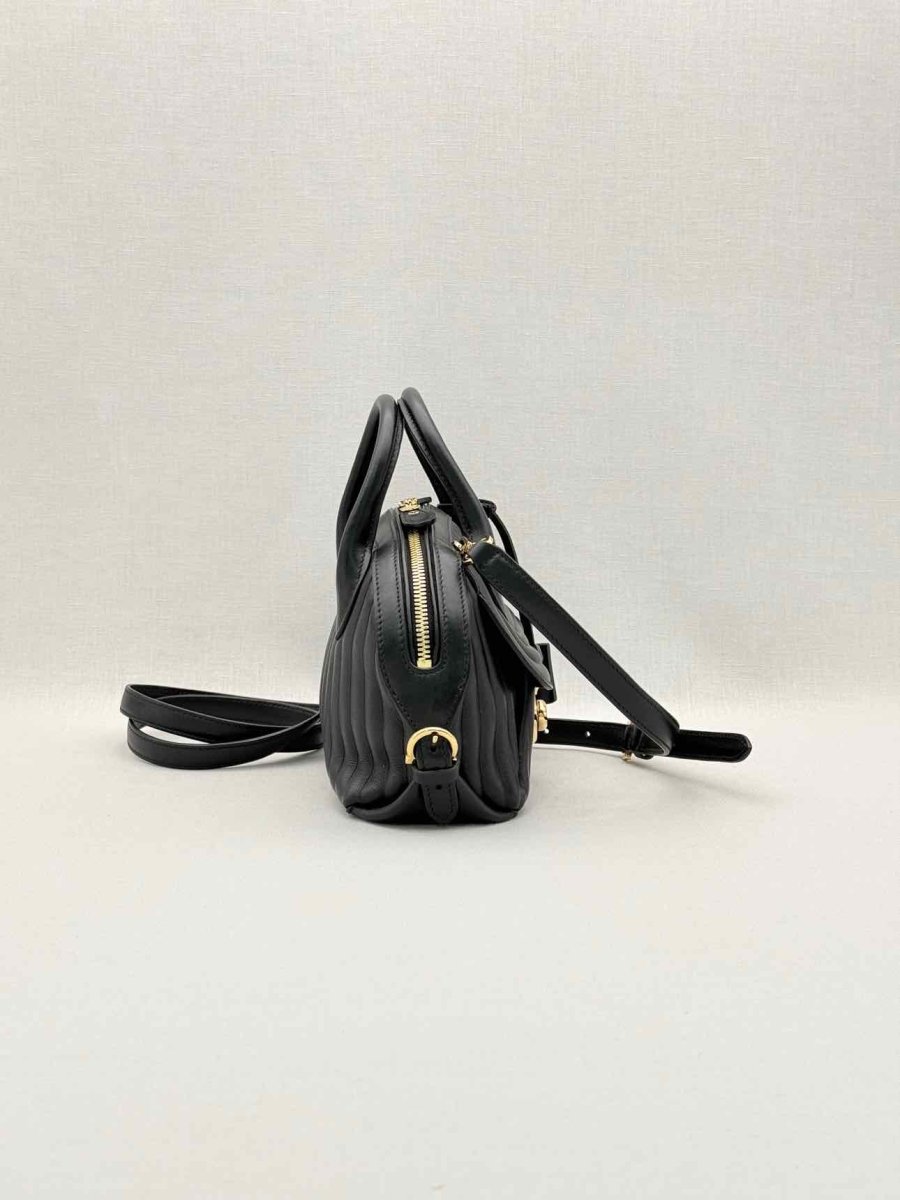 Pre-loved SALVATORE FERRAGAMO Flamma Black Quilted Satchel at Reems Closet