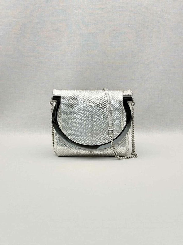 Pre-loved SALVATORE FERRAGAMO Framy Metallic Silver Clutch at Reems Closet