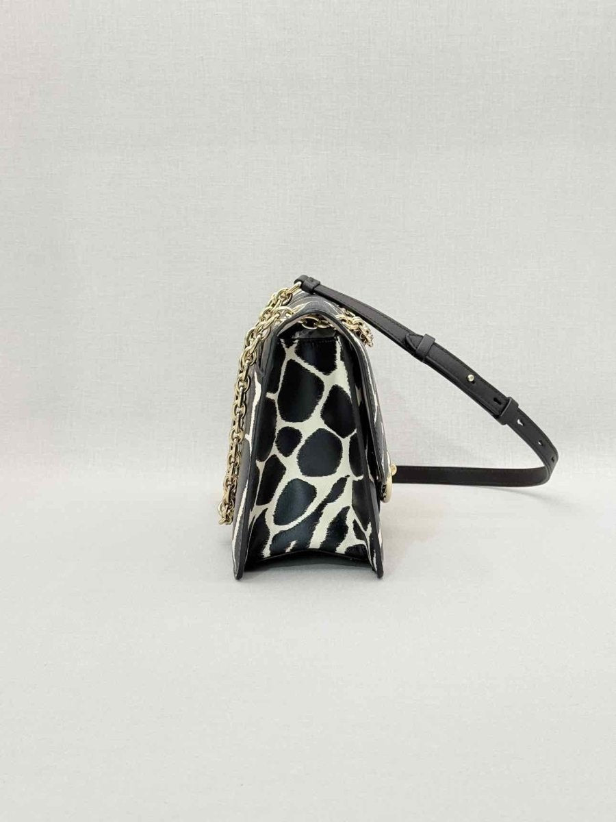 Pre-loved SALVATORE FERRAGAMO Gancini Black & White Shoulder Bag at Reems Closet