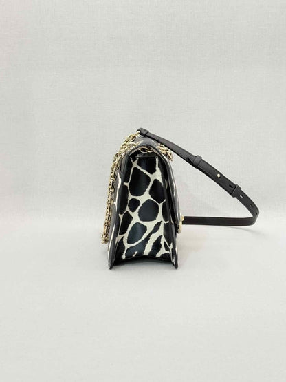 Pre-loved SALVATORE FERRAGAMO Gancini Black & White Shoulder Bag at Reems Closet