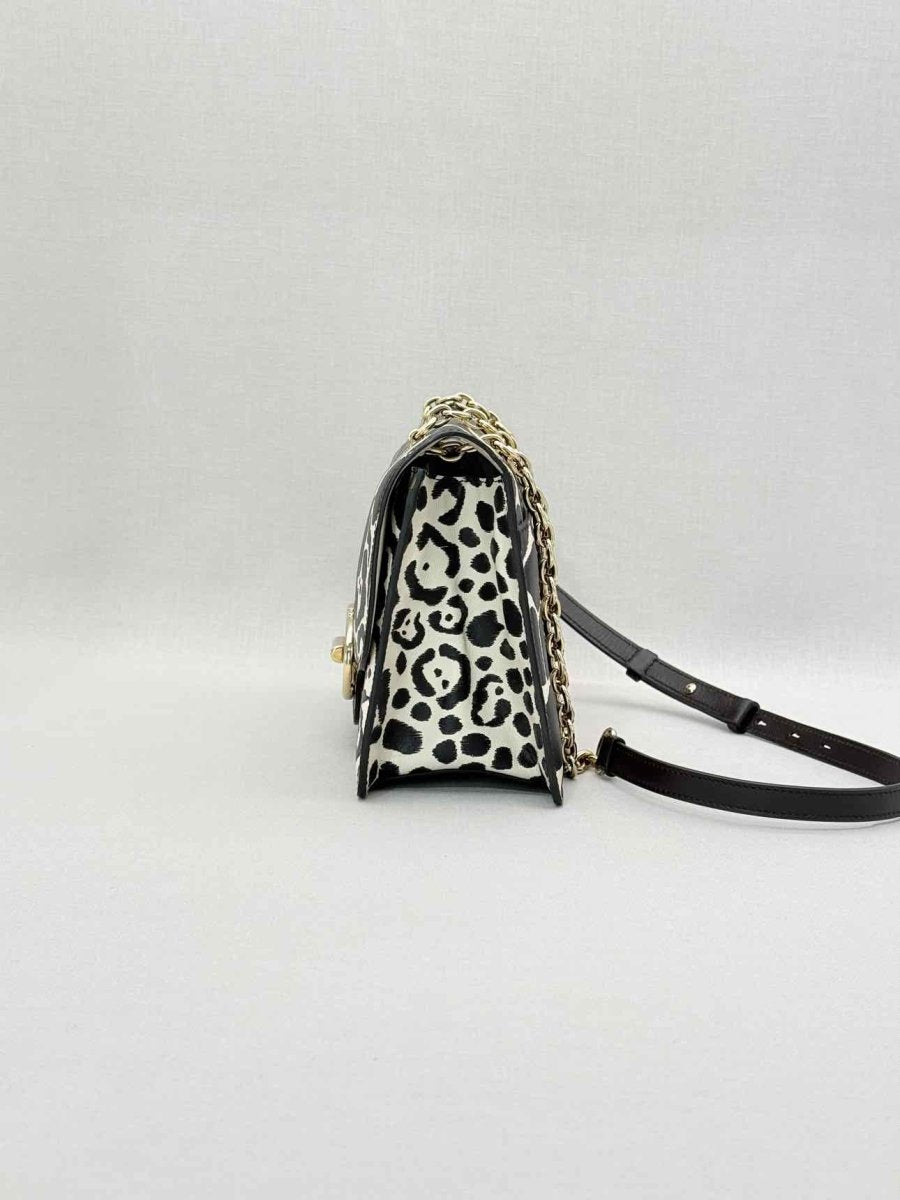 Pre-loved SALVATORE FERRAGAMO Gancini Black & White Shoulder Bag at Reems Closet