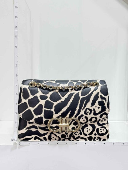 Pre-loved SALVATORE FERRAGAMO Gancini Black & White Shoulder Bag at Reems Closet