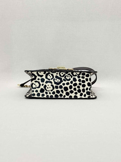 Pre-loved SALVATORE FERRAGAMO Gancini Black & White Shoulder Bag at Reems Closet