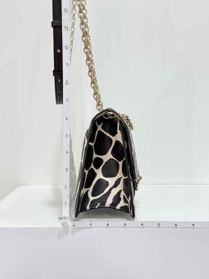 Pre-loved SALVATORE FERRAGAMO Gancini Black & White Shoulder Bag at Reems Closet