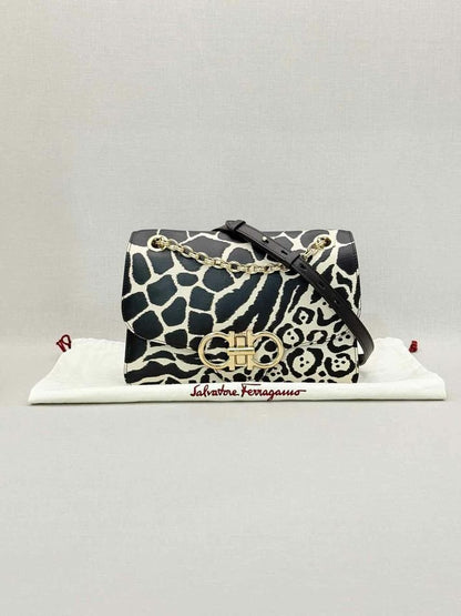Pre-loved SALVATORE FERRAGAMO Gancini Black & White Shoulder Bag at Reems Closet