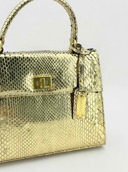 Pre - loved SANDRA J Jackie Gold Top Handle at Reems Closet
