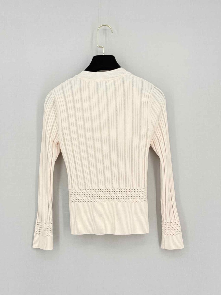 Pre-loved SANDRO Peach Size Small Cardigan at Reems Closet