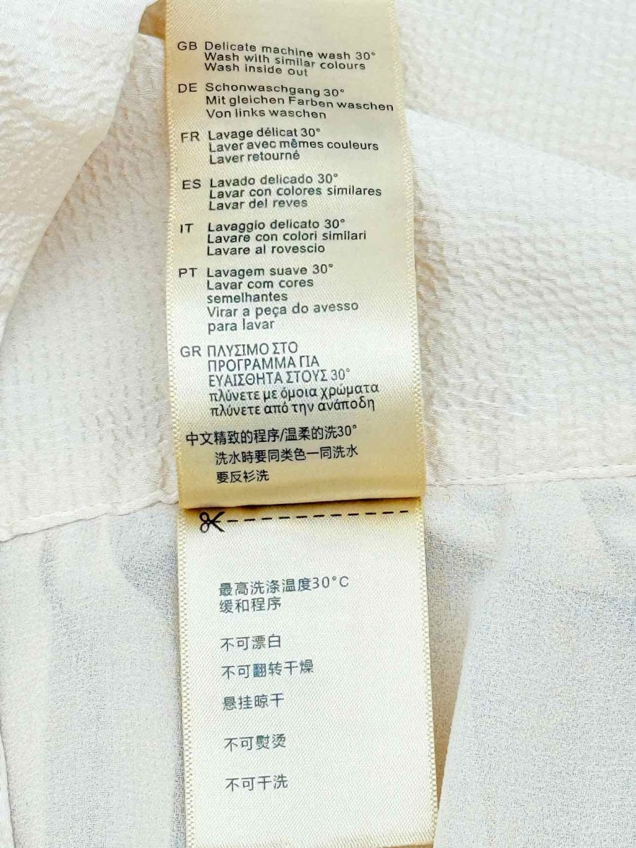 Pre - loved SCOTCH & SODA Cream Pleated Size Small Midi Skirt at Reems Closet