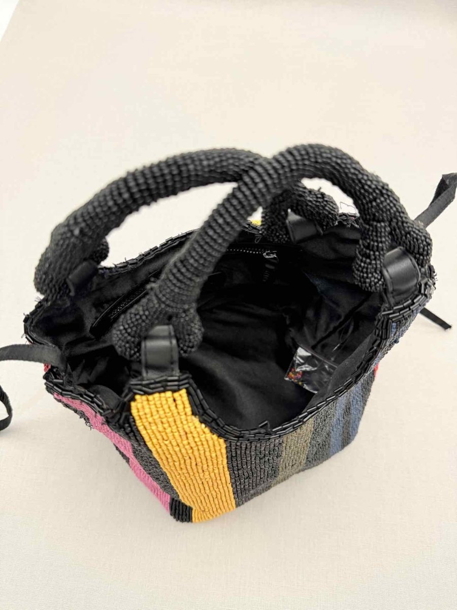 Pre-loved STAUD Cote Black Multicolor Mosaic Stripe Bucket Bag at Reems Closet