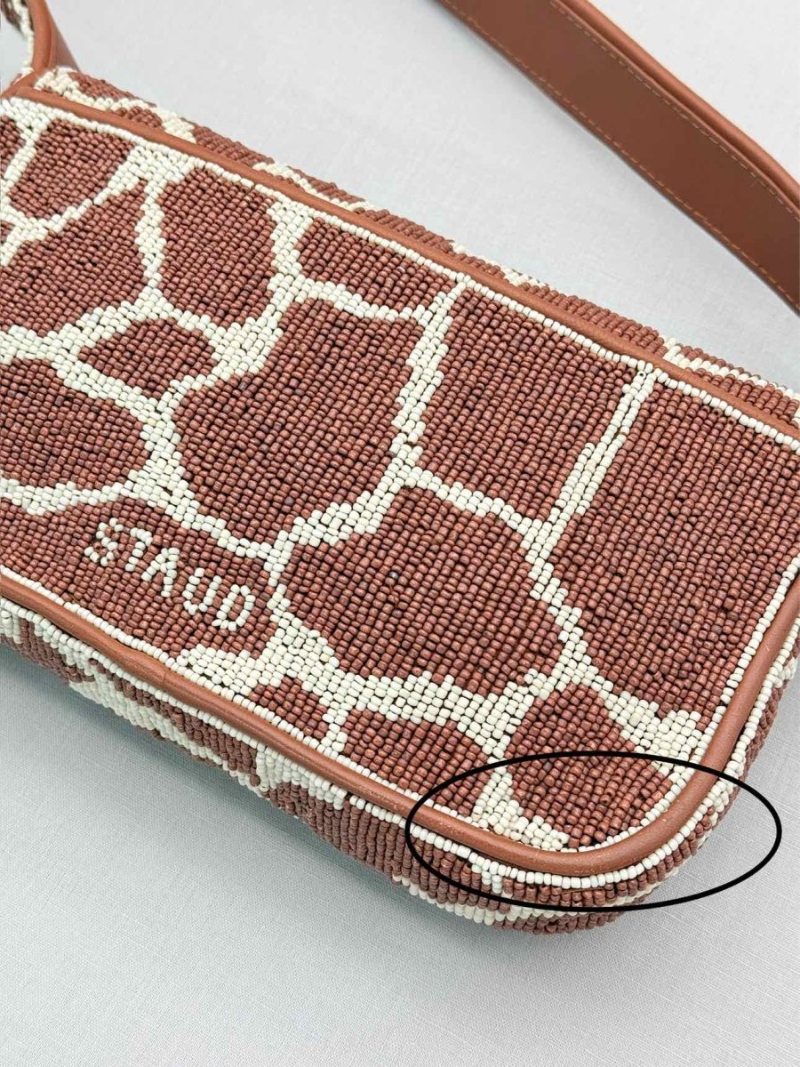 Pre-loved STAUD Tommy Brown & Beige Giraffe Print Shoulder Bag at Reems Closet