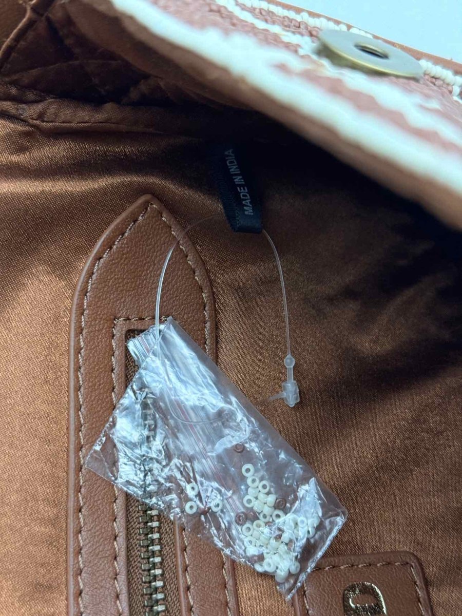 Pre-loved STAUD Tommy Brown & Beige Giraffe Print Shoulder Bag at Reems Closet