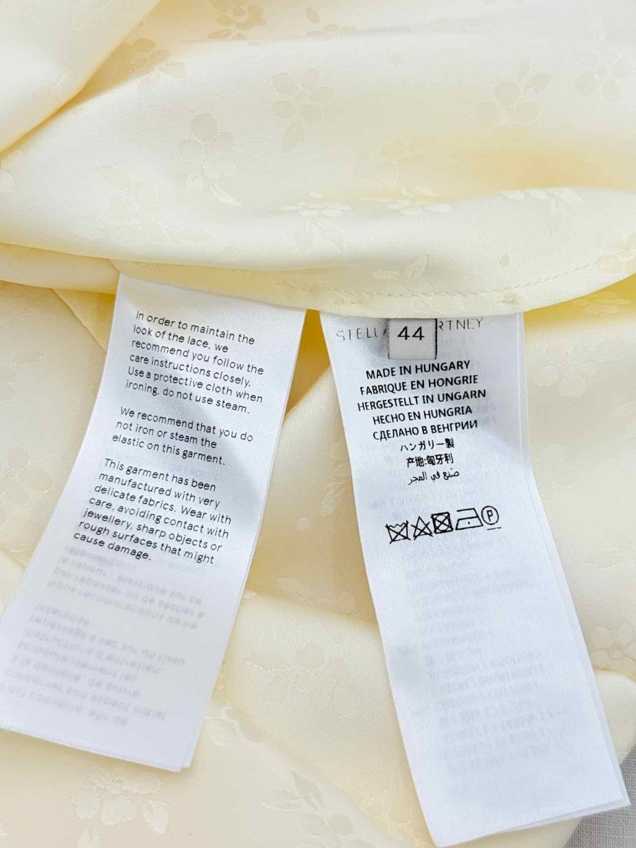 Pre - loved STELLA MCCARTNEY Cream Size US 8 Knee Length Dress at Reems Closet