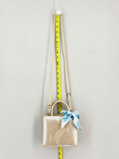 Pre-loved S'UVIMOL Metallic Beige & Silver Top Handle at Reems Closet