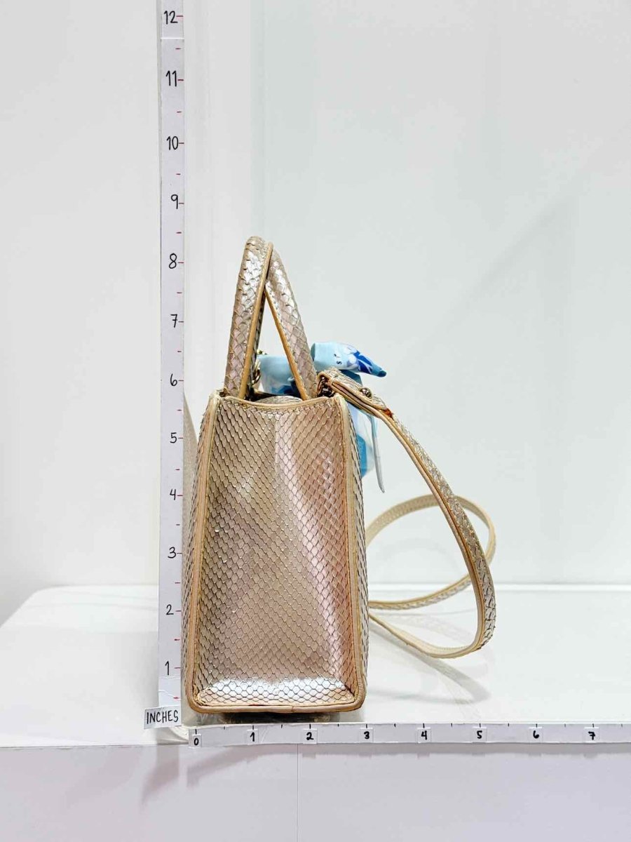 Pre-loved S'UVIMOL Metallic Beige & Silver Top Handle at Reems Closet
