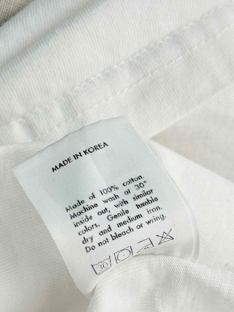 Pre - loved THE ROOM ANTWERP Open Back White Size One Size T-shirt at Reems Closet