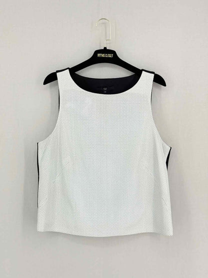 Pre-loved TIBI Off-white & Black Polka Dot Size US 10 Top at Reems Closet