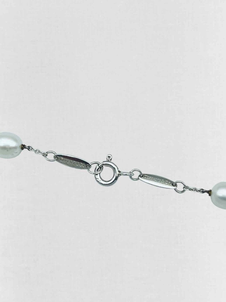 Pre - loved TIFFANY & CO Elsa Peretti White Earrings Set at Reems Closet