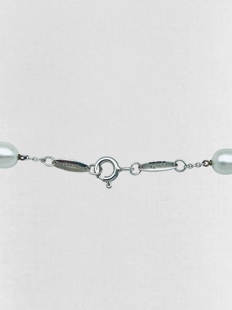 Pre - loved TIFFANY & CO Elsa Peretti White Earrings Set at Reems Closet