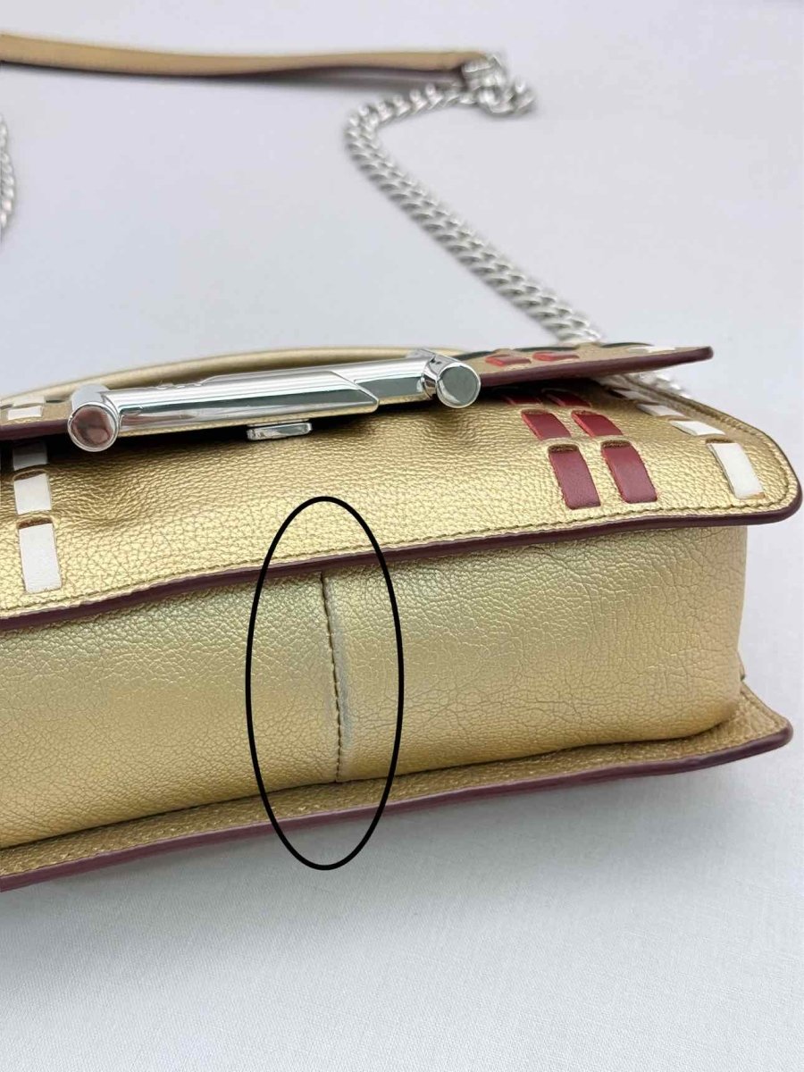 Pre-loved TOD'S Double T Metallic Gold Shoulder Bag at Reems Closet