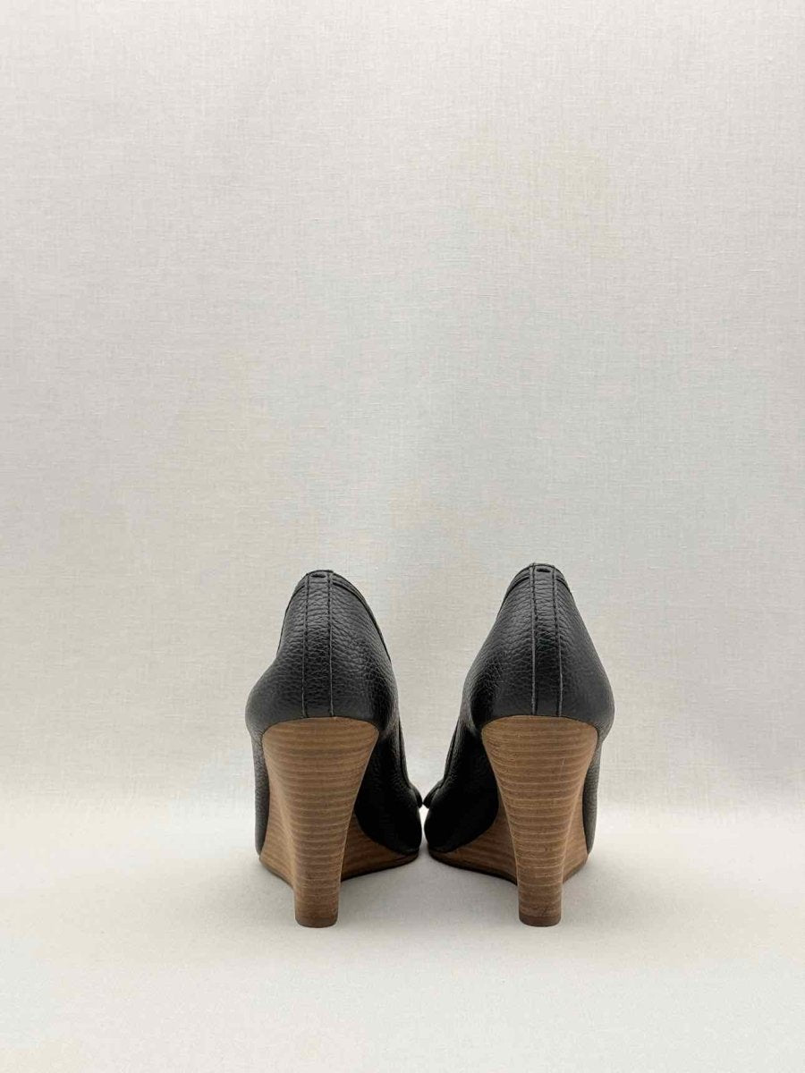 Pre-loved TORY BURCH Amanda Black Size EU 41 Wedges at Reems Closet