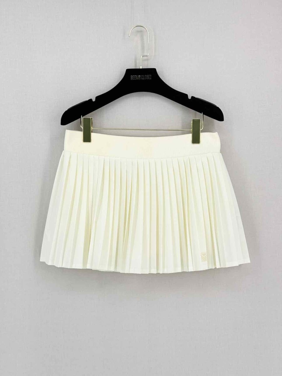 Pre-loved TORY BURCH Cream Size Medium Mini Skirt at Reems Closet