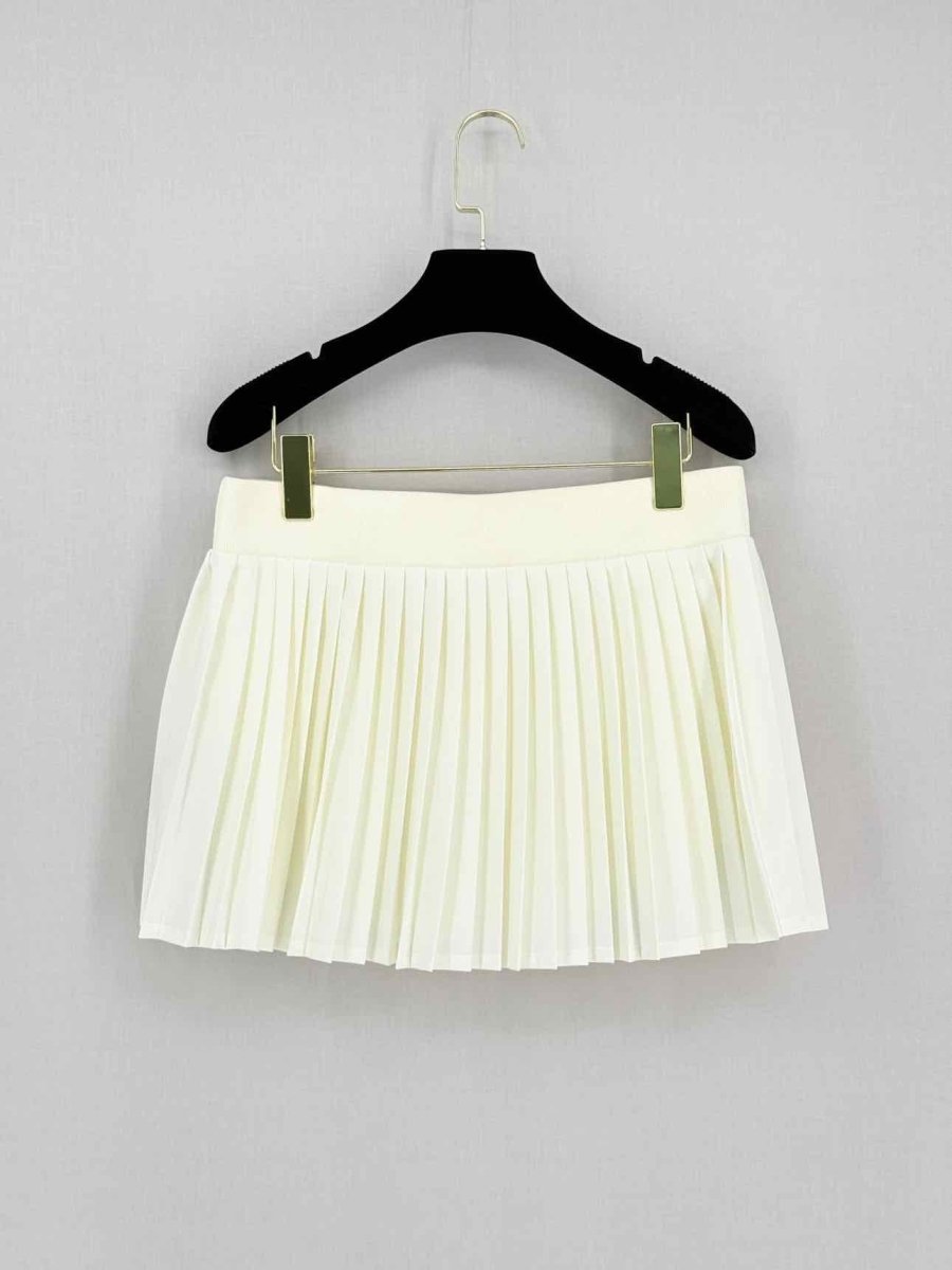 Pre-loved TORY BURCH Cream Size Medium Mini Skirt at Reems Closet