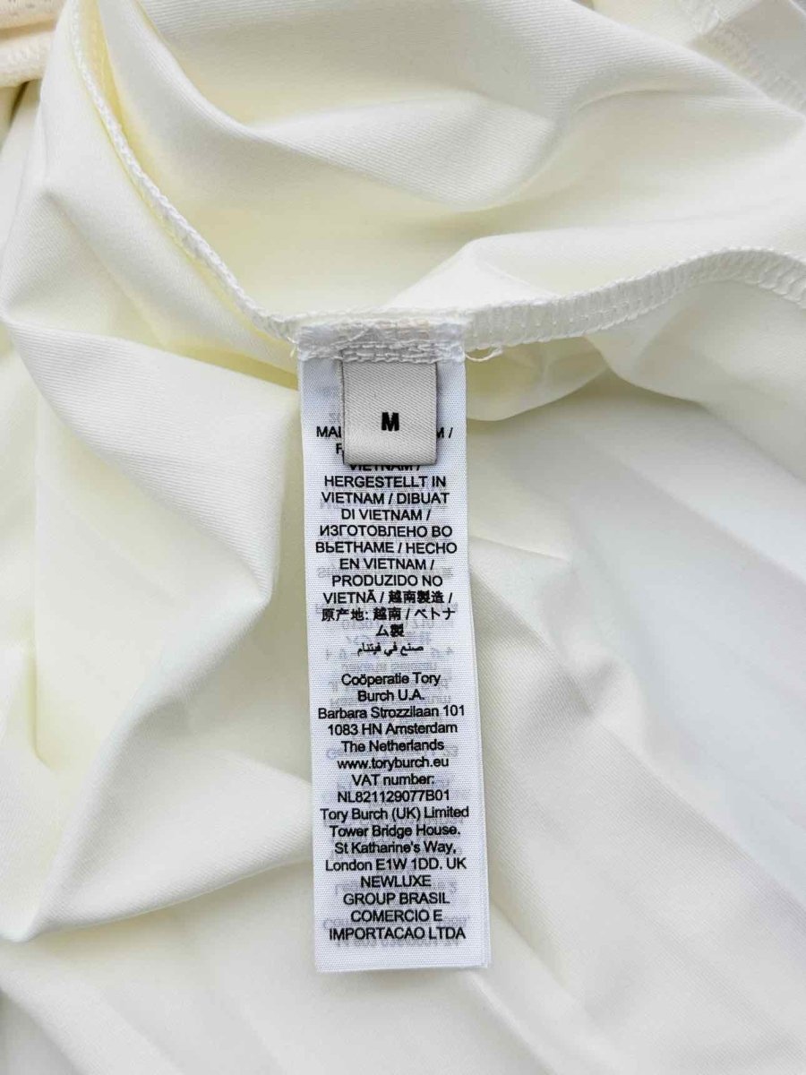 Pre-loved TORY BURCH Cream Size Medium Mini Skirt at Reems Closet