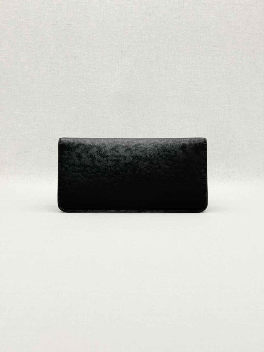 Pre-loved TORY BURCH Kira Black Clutch at Reems Closet
