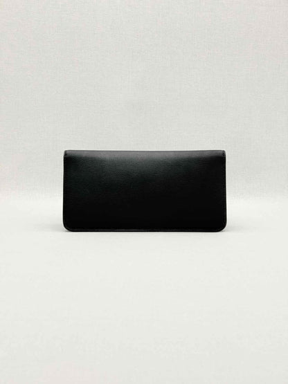 Pre-loved TORY BURCH Kira Black Clutch at Reems Closet
