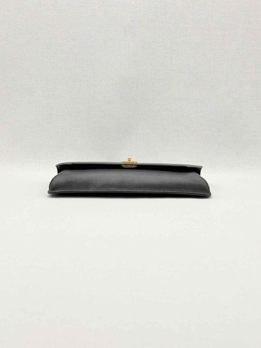 Pre-loved TORY BURCH Kira Black Clutch at Reems Closet