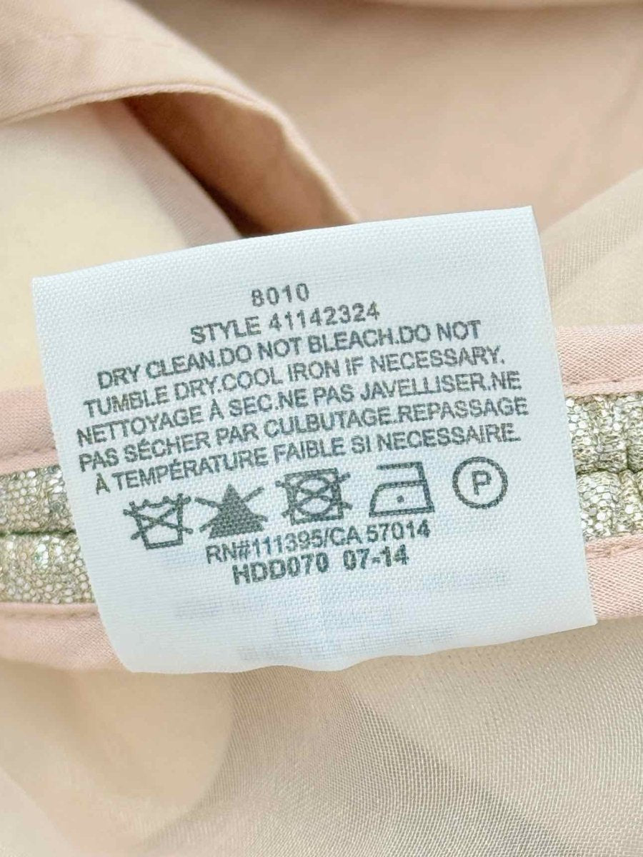 Pre - loved TORY BURCH Metallic Gold Size Large Mini Skirt at Reems Closet