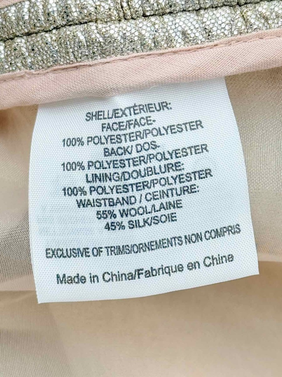 Pre - loved TORY BURCH Metallic Gold Size Large Mini Skirt at Reems Closet