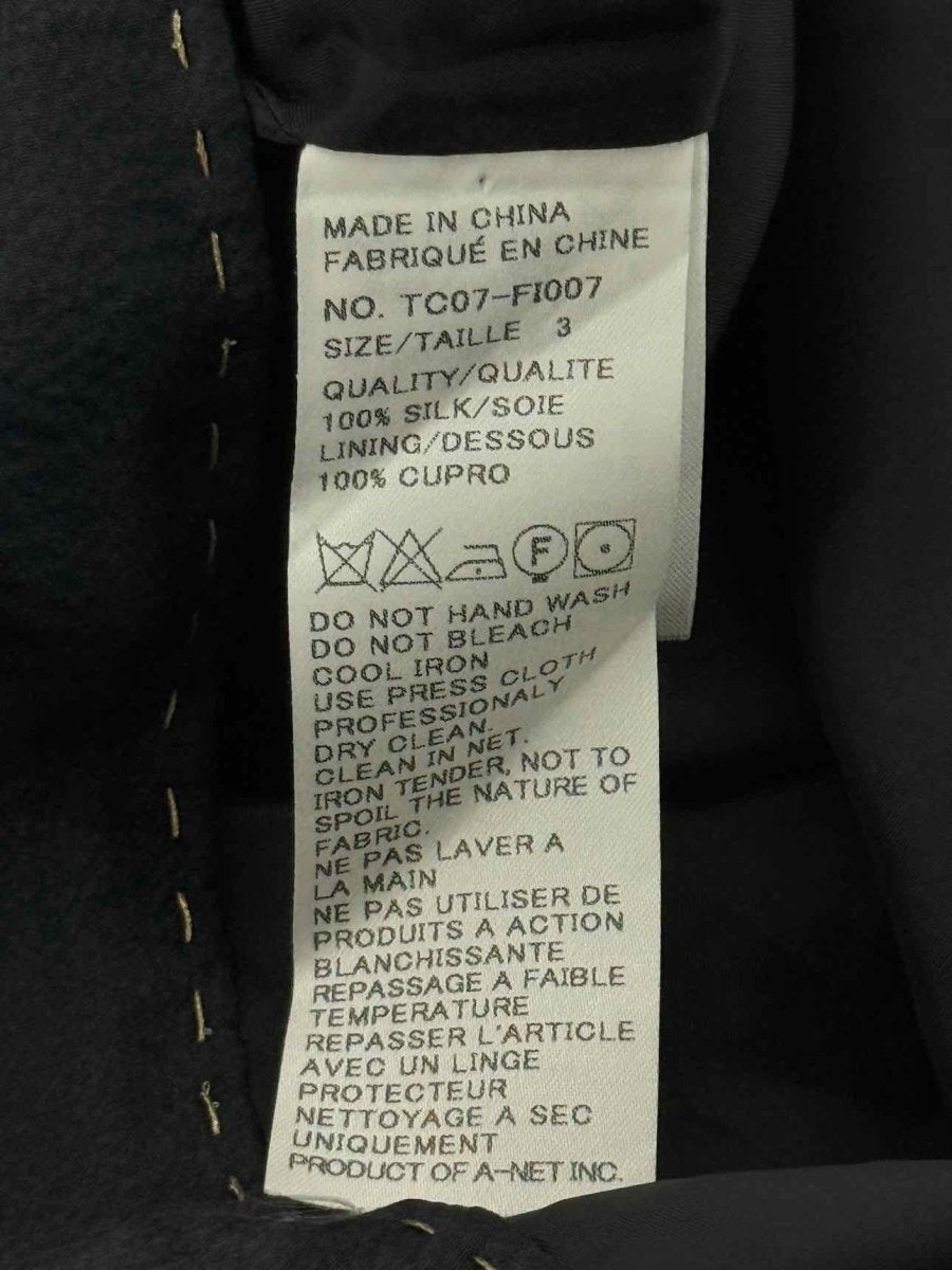 Pre - loved TSUMORI CHISATO Black Bow Print Size Medium Playsuit at Reems Closet