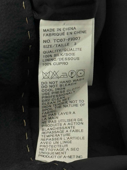 Pre - loved TSUMORI CHISATO Black Bow Print Size Medium Playsuit at Reems Closet