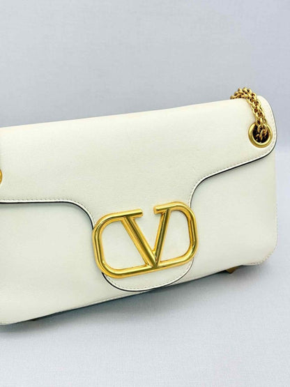 Pre-loved VALENTINO GARAVANI Stud Sign Cream Shoulder Bag at Reems Closet