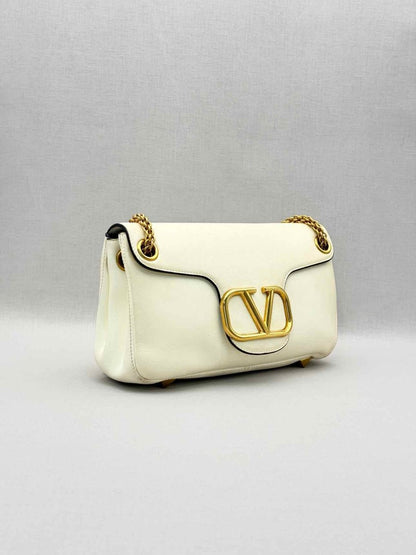 Pre-loved VALENTINO GARAVANI Stud Sign Cream Shoulder Bag at Reems Closet