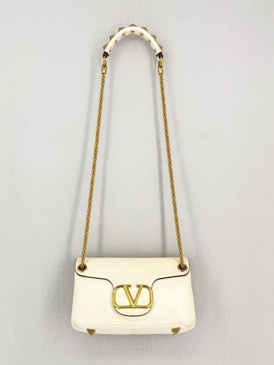 Pre-loved VALENTINO GARAVANI Stud Sign Cream Shoulder Bag at Reems Closet