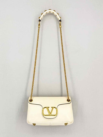 Pre-loved VALENTINO GARAVANI Stud Sign Cream Shoulder Bag at Reems Closet