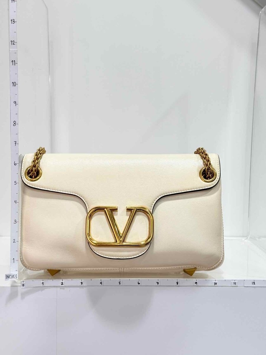 Pre-loved VALENTINO GARAVANI Stud Sign Cream Shoulder Bag at Reems Closet