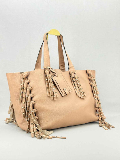 Pre - loved VALENTINO Rockstud Nude Fringed Tote Bag at Reems Closet