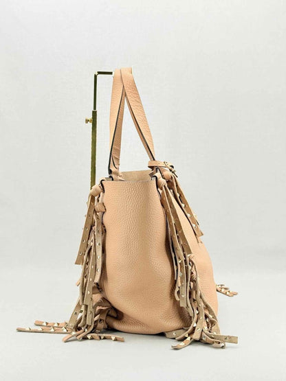 Pre - loved VALENTINO Rockstud Nude Fringed Tote Bag at Reems Closet