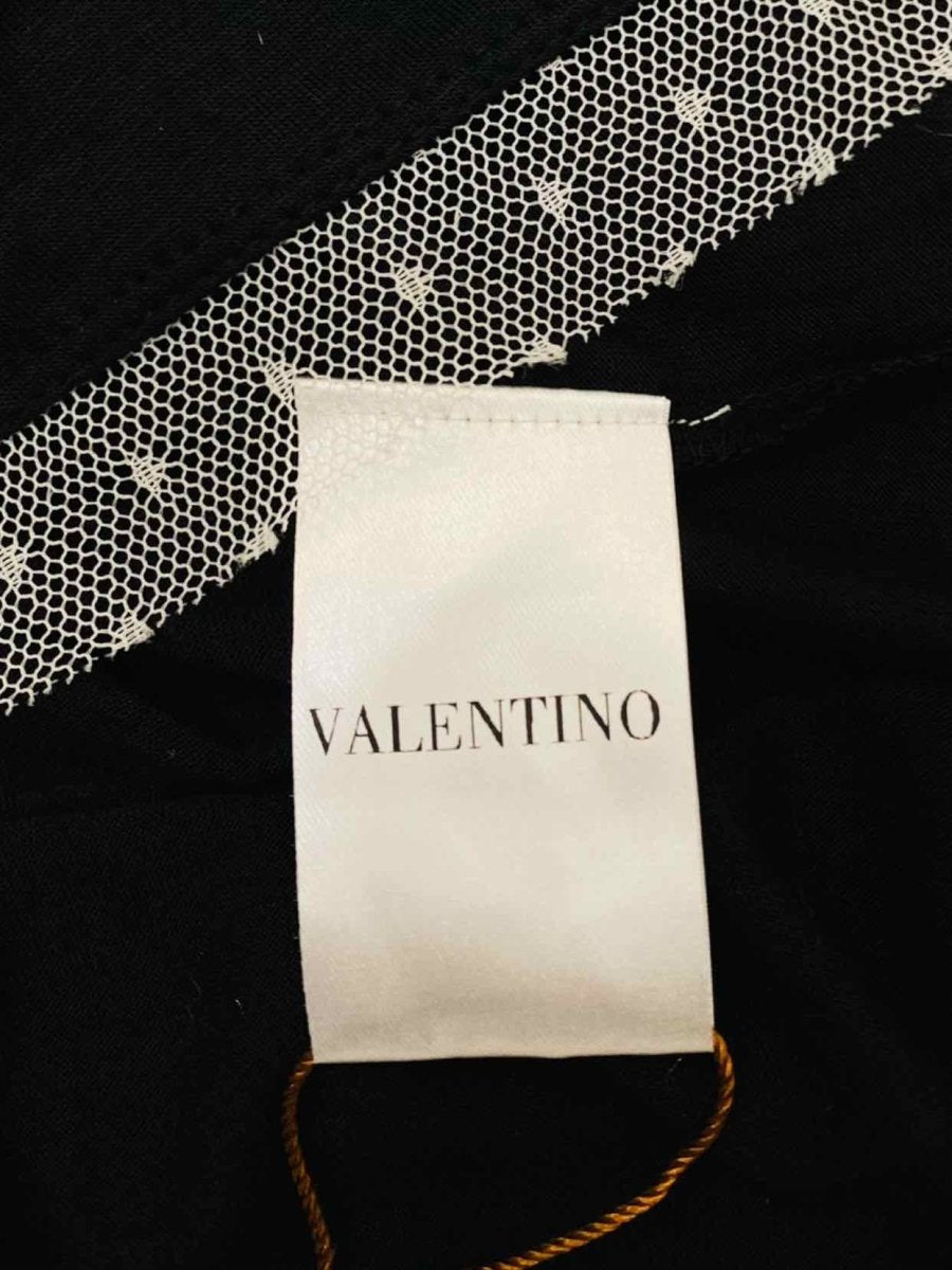 Pre - loved VALENTINO Sleeveless Black w/ White Rose Detail Top at Reems Closet