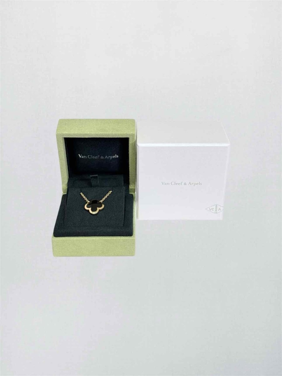 Pre-loved VAN CLEEF & ARPELS onyx 2pc Set at Reems Closet