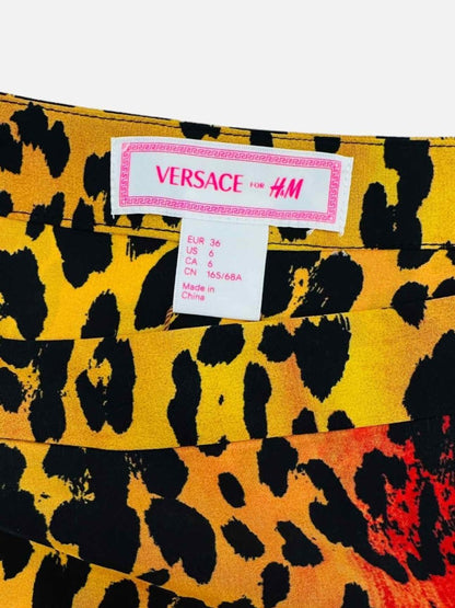 Pre - loved VERSACE Black Multicolor Leopard Print Mini Skirt at Reems Closet