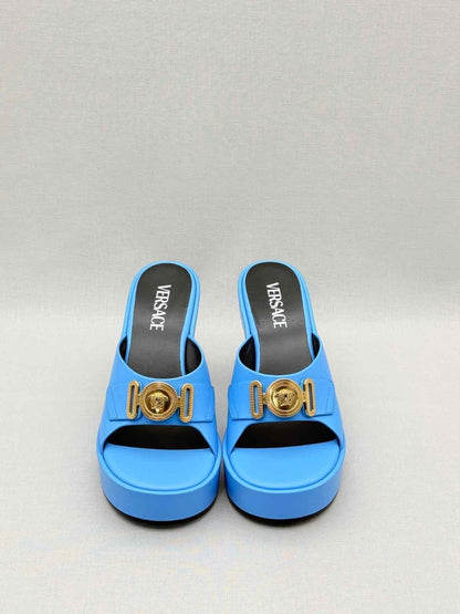 Pre-loved VERSACE Medusa Biggie Blue Size EU 37 Mules at Reems Closet