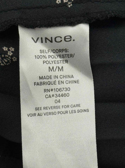 Pre - loved VINCE Black Floral Print Size Medium Midi Dress at Reems Closet