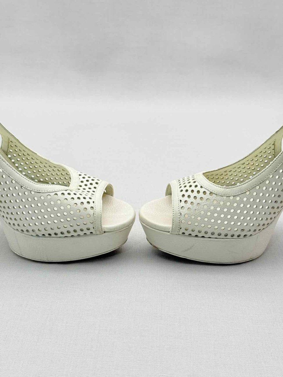 Pre-loved YSL Off-white Perforated Size EU 39.5 Pumps at Reems Closet