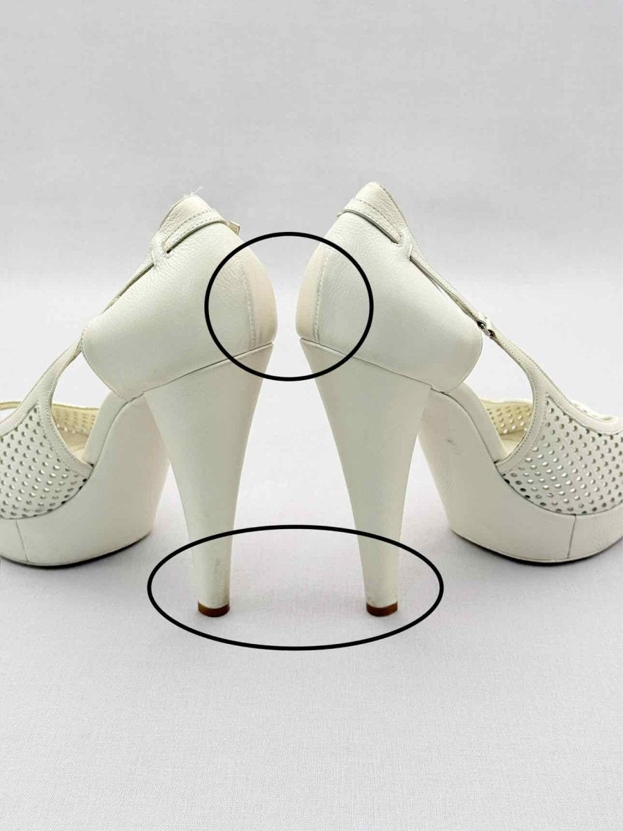 Pre-loved YSL Off-white Perforated Size EU 39.5 Pumps at Reems Closet