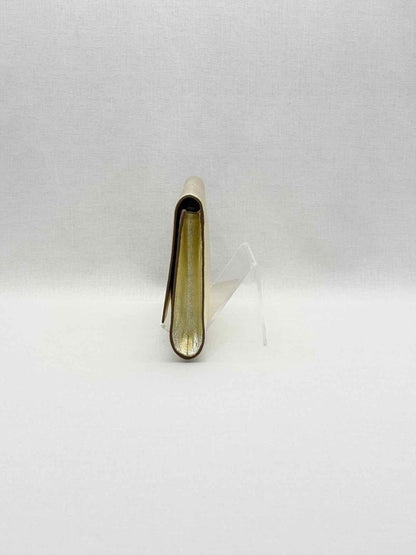 Pre-loved YVES SAINT LAURENT Belle De Jour Metallic Gold Clutch at Reems Closet